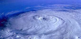 Hurricane forming above earth from space