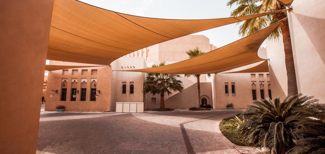 This convention centre uses passive cooling features like awnings, plants, pale walls and small windows. Photo: Jaanus Jagomagi - unsplash.com Courtyard with covered shade