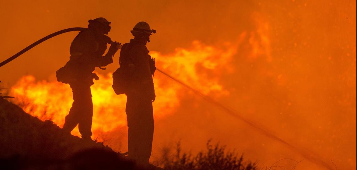 Good design can substantally reduce the risk that wildfire poses to your property and even your life. Credit: skeeze - pixabay.com https://pixabay.com/photos/forest-fire-hose-water-wildfire-3694495/ Firefighters use a hose to control a wildfire
