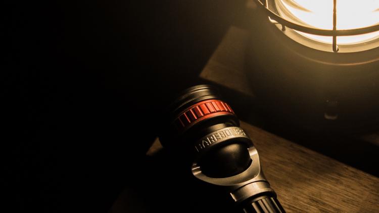 If the mains power fails, battery powered torches and oil lamps can be used instead. Photo: Matthew Brodeur/Unsplash Lantern and torch on a table