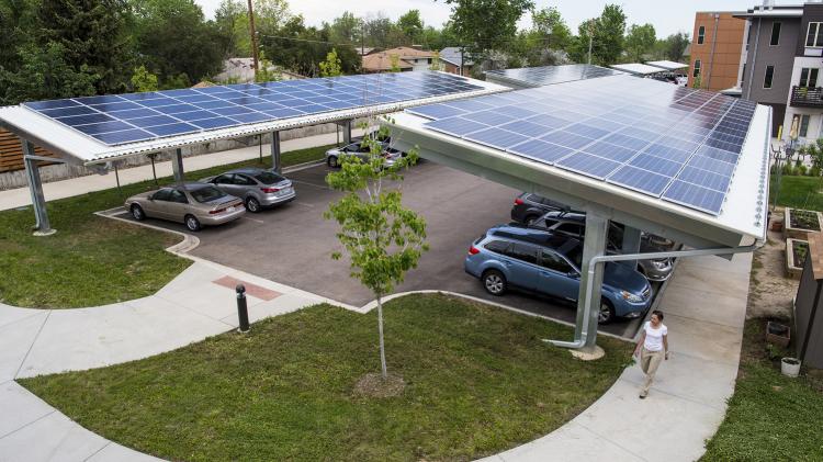 Photovoltaic solar power is easily installed at domestic scale. Photo: National Renewable Energy Lab - https://www.flickr.com/photos/nrel/34959273860 under creative commons https://creativecommons.org/licenses/by-nc-nd/2.0/ Parking lot with solar panels on the roof